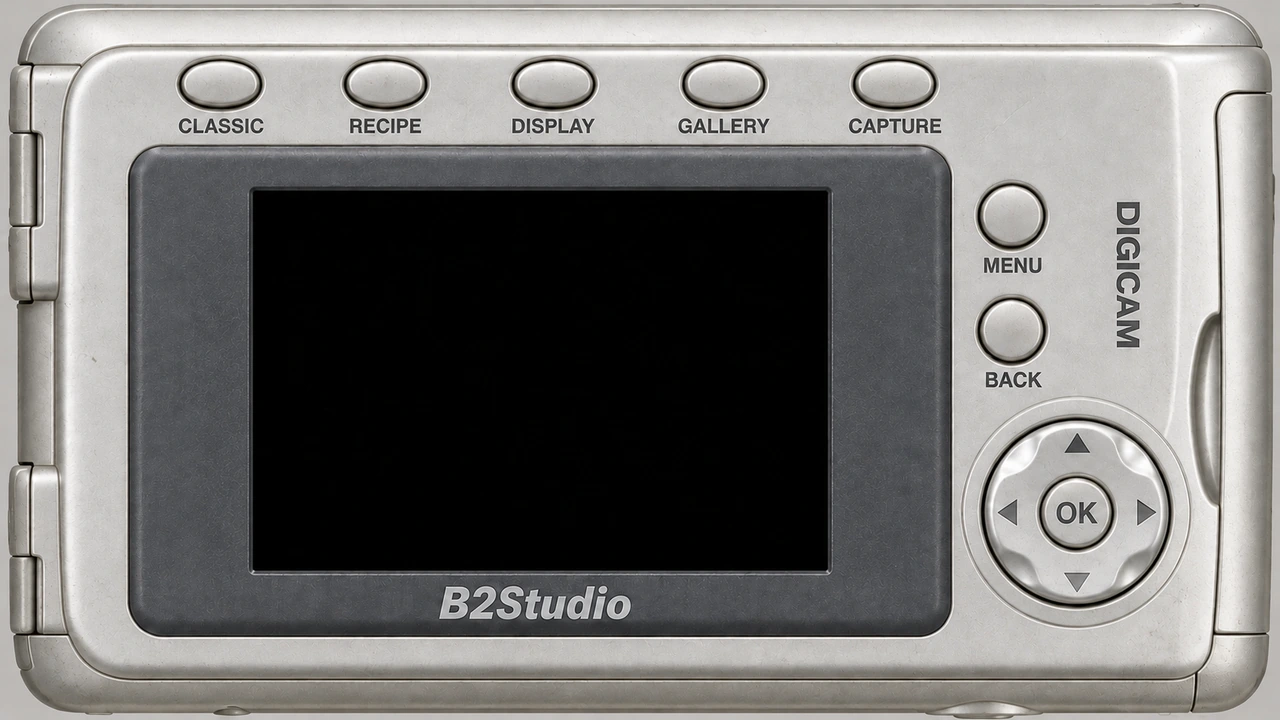 Silver B2 Studio pocket camera with a small screen and physical controls